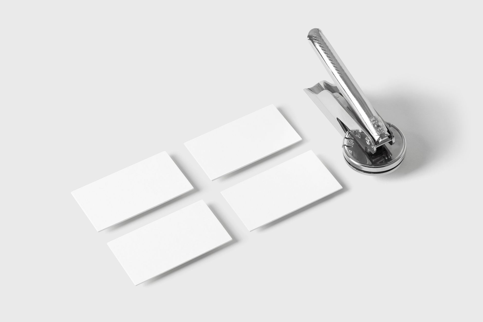 Blank business cards on a clean white desk